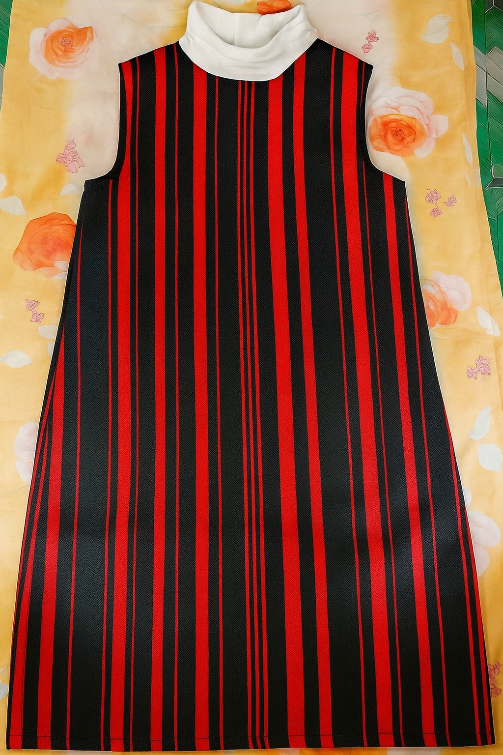 A-sleeveless dress with a mock turtleneck